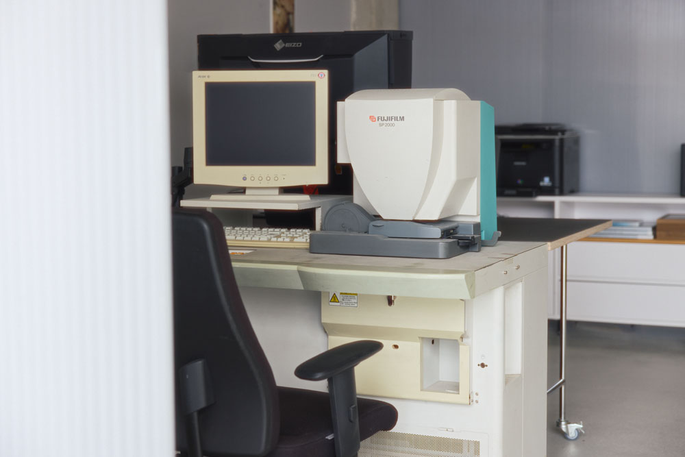 Fujifilm SP2000 film scanner on a desk